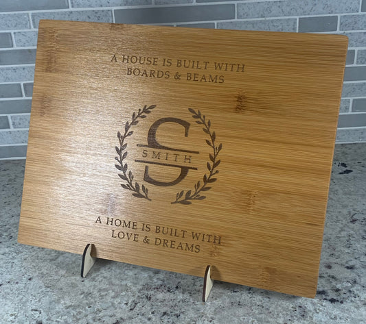 A HOME IS BUILT WITH LOVE & DREAMS - 9"X12" BAMBOO CUTTING BOARD